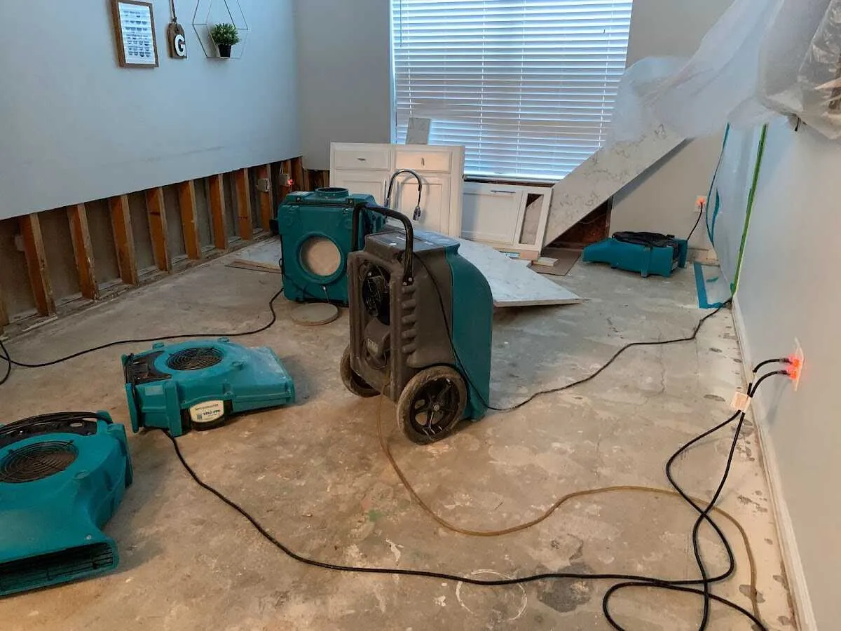 Dehumidifier in flood-cut room for Water Damage Restoration in Hialeah